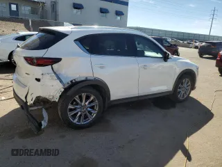 2019 Mazda CX-5 Grand Touring with VIN JM3KFADM4K1674408, listed as a Copart auction lot 47684015 with 77,554 mi miles and Salvage Title. Bid and sale history available at carsss.com. Image 3.