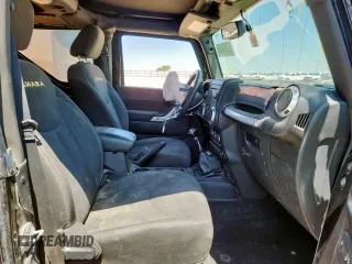 2015 Jeep Wrangler Sahara с VIN 1C4AJWBG4FL615303, выставлен на аукционе Copart как лот 57070465 с пробегом Не указан миль и Списание • Salvage title. История ставок и продаж доступна на DreamBid. Изображение 7.