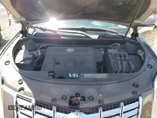 2015 Cadillac SRX Luxury Collection z VIN 3GYFNBE35FS555046, wystawiony jako Copart lot #57589155 z przebiegiem 108 456 mil mil oraz Szkoda całkowita • Salvage title. Historia ofert i sprzedaży dostępna na DreamBid. Obrazek 12.