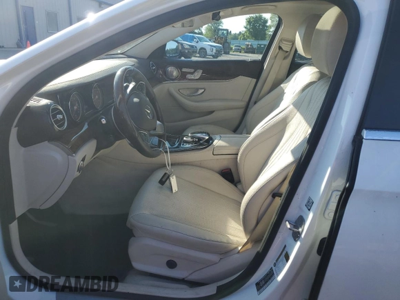 2017 Mercedes-Benz E 300 Luxury with VIN WDDZF4KB3HA127588, listed as a Copart auction lot 60510675 with 100,098 mi miles and Salvage title. Bid and sale history available at DreamBid. Image 7.