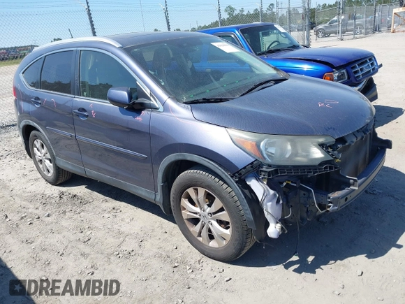 2012 Honda CR-V EX-L with VIN JHLRM4H78CC027960, listed as a IAAI auction lot 42029819 with 165,000 mi miles. Bid and sale history available at carsss.com. Image 1.