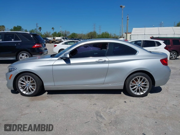 2015 BMW 2 Series 228i with VIN WBA1F5C58FV257570, listed as a IAAI auction lot 41783929 with 229,893 mi miles. Bid and sale history available at carsss.com. Image 14.