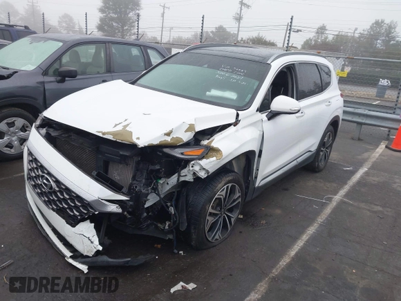 2019 Hyundai Santa Fe Ultimate with VIN 5NMS5CAA3KH036089, listed as a IAAI auction lot 40810710 with 62,561 mi miles and . Bid and sale history available at DreamBid. Image 18.