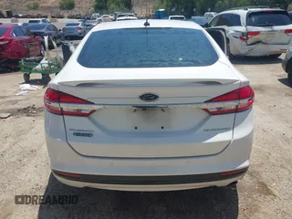 2017 Ford Fusion Titanium z VIN 3FA6P0SU0HR329224, wystawiony jako IAAI lot #42291605 z przebiegiem 176 728 mil mil oraz . Historia ofert i sprzedaży dostępna na DreamBid. Obrazek 17.