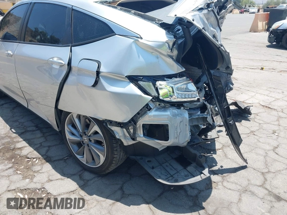 2018 Honda Clarity Touring z VIN JHMZC5F31JC021516, wystawiony jako IAAI lot #42478787 z przebiegiem 87 519 mil mil oraz . Historia ofert i sprzedaży dostępna na DreamBid. Obrazek 18.