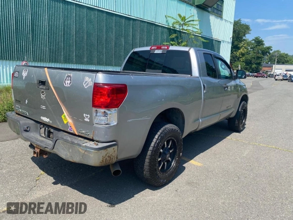 2010 Toyota Tundra with VIN 5TFUM5F11AX01281, listed as a Copart auction lot 66980935 with 308,906 mi miles and Clean title. Bid and sale history available at DreamBid. Image 4.