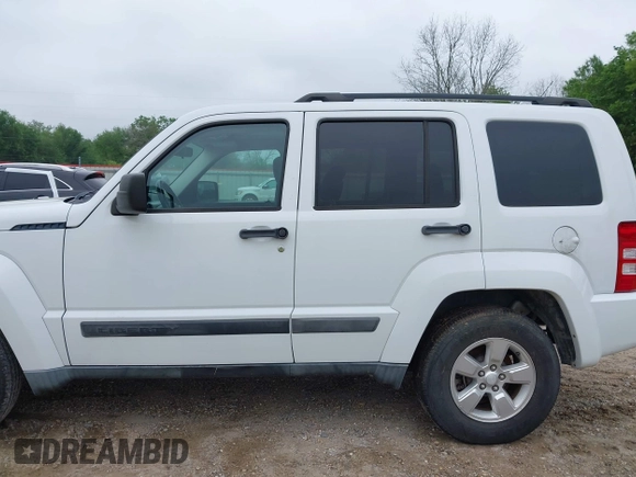 2011 Jeep Liberty Sport Jet with VIN 1J4PP2GK7BW526472, listed as a IAAI auction lot 41931452 with 105,122 mi miles and . Bid and sale history available at DreamBid. Image 14.
