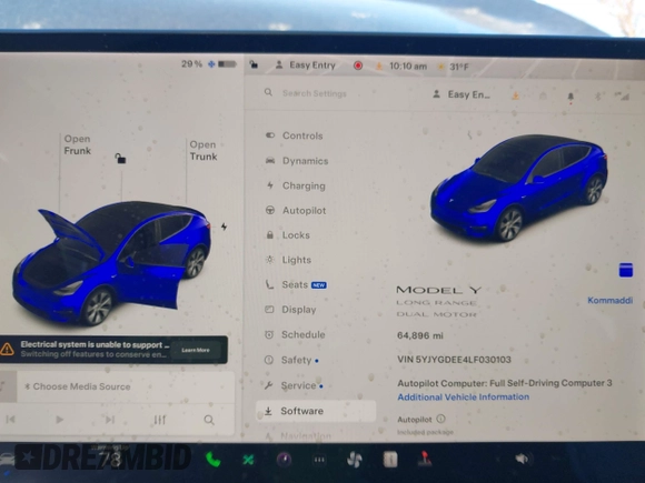 2020 Tesla Model Y Long Range with VIN 5YJYGDEE4LF030103, listed as a IAAI auction lot 41328929 with 64,896 mi miles and . Bid and sale history available at DreamBid. Image 7.