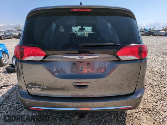 2017 Chrysler Pacifica Touring L Plus with VIN 2C4RC1EG9HR538451, listed as a Copart auction lot 52780275 with 121,915 mi miles and Salvage Title. Bid and sale history available at DreamBid. Image 6.