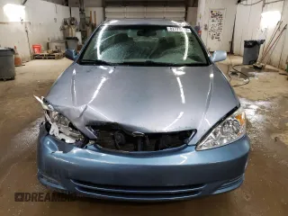 2004 Toyota Camry LE with VIN 4T1BE32K64U812388, listed as a Copart auction lot 82777563 with 209,219 mi miles and Clean Title. Bid and sale history available at carsss.com. Image 5.