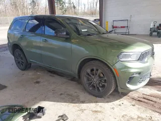 2021 Dodge Durango GT Plus with VIN 1C4RDJDG0MC766453, listed as a IAAI auction lot 41888693 with 59,377 mi miles. Bid and sale history available at carsss.com. Image 1.