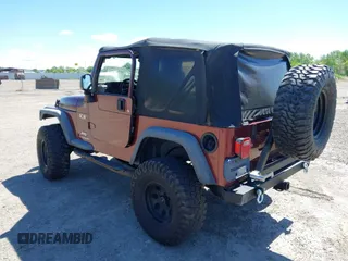 2004 Jeep Wrangler X with VIN 1J4FA39SX4P717980, listed as a IAAI auction lot 42334875 with 141,584 mi miles and . Bid and sale history available at DreamBid. Image 3.