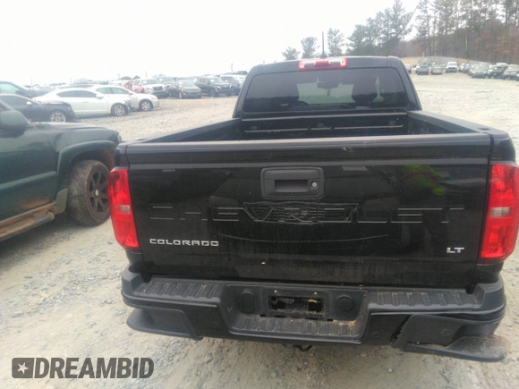 2021 Chevrolet Colorado 2WD LT with VIN 1GCHSCEA4M1256299, listed as a IAAI auction lot 41173669 with 90,969 mi miles and . Bid and sale history available at DreamBid. Image 16.