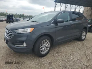 2021 Ford Edge SEL z VIN 2FMPK3J90MBA53661, wystawiony jako Copart lot #54818205 z przebiegiem 126 511 mil mil oraz Czysty tytuł • Clean title. Historia ofert i sprzedaży dostępna na DreamBid. Obrazek 1.