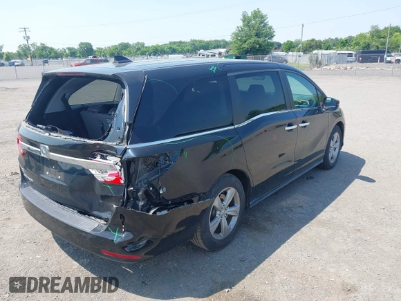 2018 Honda Odyssey EX-L z VIN 5FNRL6H76JB032182, wystawiony jako IAAI lot #42413124 z przebiegiem 67 402 mil mil oraz . Historia ofert i sprzedaży dostępna na DreamBid. Obrazek 4.