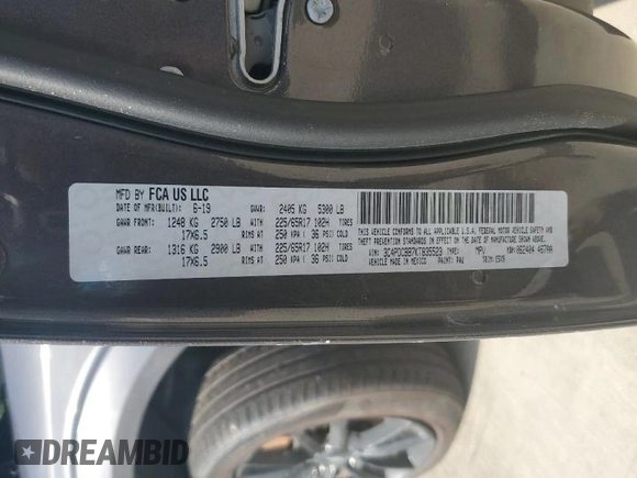 2019 Dodge Journey SE z VIN 3C4PDCBB7KT835523, wystawiony jako Copart lot #64476914 z przebiegiem 91 143 mil mil oraz Szkoda całkowita • Salvage title. Historia ofert i sprzedaży dostępna na DreamBid. Obrazek 13.