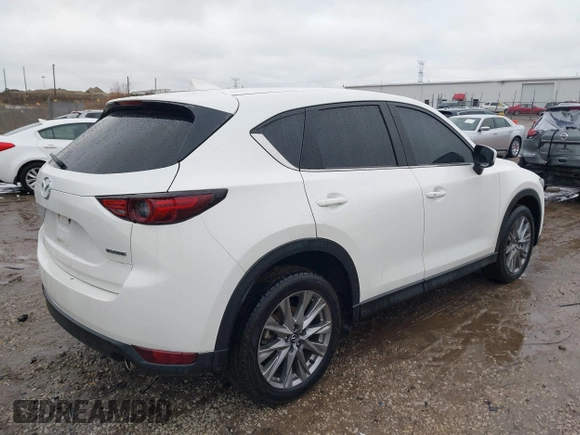 2021 Mazda CX-5 Grand Touring with VIN JM3KFADM4M1340141, listed as a IAAI auction lot 41194711 with 37,887 mi miles. Bid and sale history available at carsss.com. Image 4.