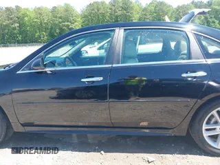 2014 Chevrolet Impala LTZ with VIN 2G1WC5E39E1168726, listed as a IAAI auction lot 42133295 with 146,902 mi miles and . Bid and sale history available at DreamBid. Image 14.