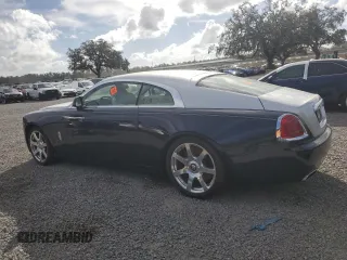 2014 Rolls-Royce Wraith z VIN SCA665C55EUX84597, wystawiony jako Copart lot #79843344 z przebiegiem Nie podano mil oraz Szkody całkowita. Historia ofert i sprzedaży dostępna na DreamBid. Obrazek 2.