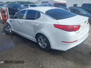 2015 Kia Optima LX z VIN 5XXGM4A73FG438282, wystawiony jako IAAI lot #42389042 z przebiegiem 228 753 mil mil oraz . Historia ofert i sprzedaży dostępna na DreamBid. Obrazek 3.