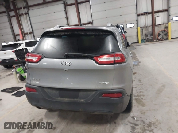 2016 Jeep Cherokee Altitude with VIN 1C4PJMCB6GW295404, listed as a IAAI auction lot 41211758 with 100,722 mi miles and . Bid and sale history available at DreamBid. Image 16.