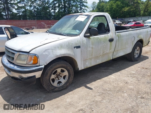 1998 Ford F-150 with VIN 1FTZF1724WKB57921, listed as a IAAI auction lot 42706692 with 213,913 mi miles and . Bid and sale history available at DreamBid. Image 2.