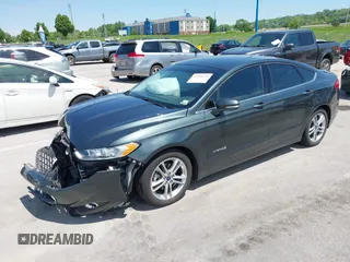 2015 Ford Fusion SE Hybrid with VIN 3FA6P0LU7FR224823, listed as a IAAI auction lot 42199479 with 81,835 mi miles and . Bid and sale history available at DreamBid. Image 2.