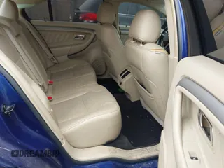 2014 Ford Taurus SEL with VIN 1FAHP2E80EG106719, listed as a IAAI auction lot 41967594 with 194,426 mi miles and . Bid and sale history available at DreamBid. Image 8.