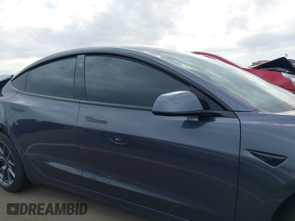 2022 Tesla Model 3 Long Range with VIN 5YJ3E1EB9NF164774, listed as a IAAI auction lot 41915755 with 39,625 mi miles and . Bid and sale history available at DreamBid. Image 13.