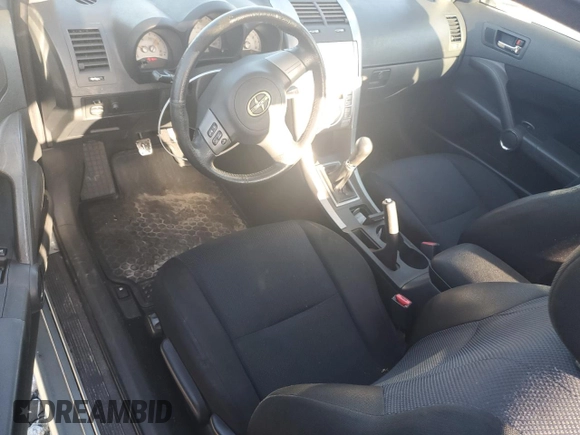 2006 Scion tC z VIN JTKDE177060137498, wystawiony jako Copart lot #52748195 z przebiegiem 194 151 mil mil oraz Szkoda całkowita • Salvage title. Historia ofert i sprzedaży dostępna na DreamBid. Obrazek 8.