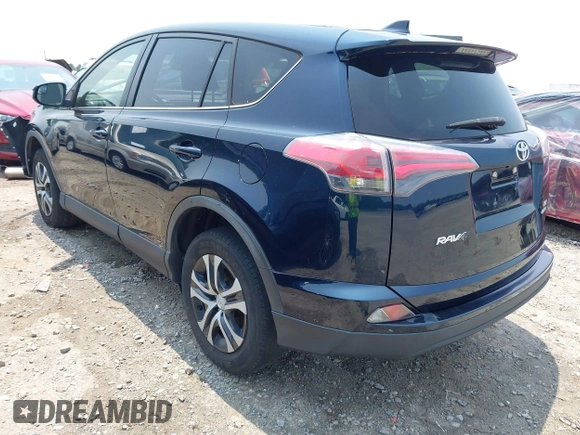 2017 Toyota RAV4 LE with VIN JTMBFREV5HJ173180, listed as a IAAI auction lot 42402753 with 97,917 mi miles and . Bid and sale history available at DreamBid. Image 3.