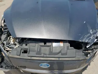 2017 Ford Focus Titanium with VIN 1FADP3J20HL253446, listed as a Copart auction lot 64196895 with 150,633 mi miles and Salvage title. Bid and sale history available at DreamBid. Image 11.