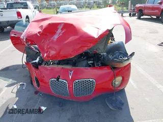 2008 Pontiac Solstice z VIN 1G2MB35B58Y102189, wystawiony jako IAAI lot #42146408 z przebiegiem Nie podano mil oraz . Historia ofert i sprzedaży dostępna na DreamBid. Obrazek 12.