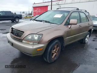 1999 Lexus RX 300 Luxury SUV with VIN JT6HF10U5X0061520, listed as a IAAI auction lot 41612890 with 254,864 mi miles. Bid and sale history available at carsss.com. Image 2.