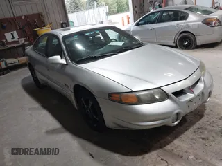 2000 Pontiac Bonneville SLE z VIN 1G2HY54K8Y4266136, wystawiony jako IAAI lot #37856460 z przebiegiem 190 979 mil mil oraz . Historia ofert i sprzedaży dostępna na DreamBid. Obrazek 1.
