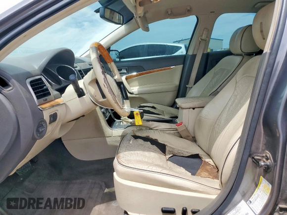 2012 Lincoln MKZ with VIN 3LNHL2GC6CR805328, listed as a Copart auction lot 60162615 with 140,389 mi miles and Salvage title. Bid and sale history available at DreamBid. Image 7.