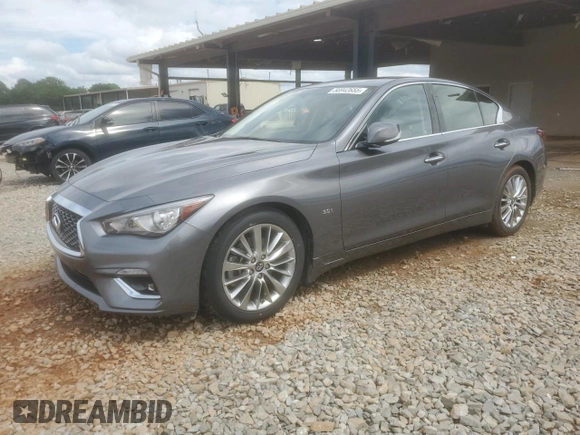 2019 Infiniti Q50 Luxe with VIN JN1EV7AP6KM517944, listed as a Copart auction lot 56942655 with 94,883 mi miles and Salvage title. Bid and sale history available at DreamBid. Image 1.
