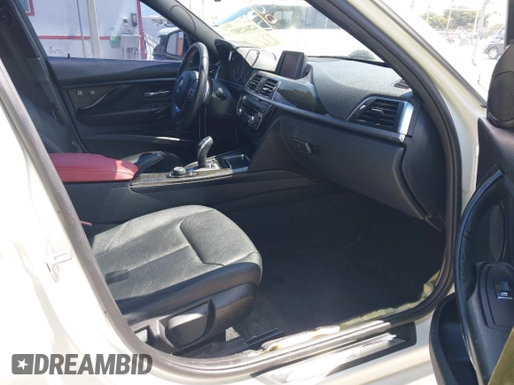 2018 BMW 3 Series 330i with VIN WBA8B9G52JNU57283, listed as a IAAI auction lot 42042507 with 51,740 mi miles and . Bid and sale history available at DreamBid. Image 5.
