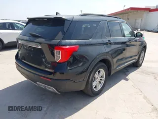 2023 Ford Explorer XLT with VIN 1FMSK7DH5PGB18456, listed as a IAAI auction lot 42067888 with 20,856 mi miles. Bid and sale history available at carsss.com. Image 4.