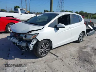 2017 Honda Fit EX-L z VIN JHMGK5H84HS013316, wystawiony jako IAAI lot #42157698 z przebiegiem 67 104 mil mil oraz . Historia ofert i sprzedaży dostępna na DreamBid. Obrazek 2.