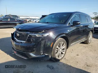 2020 Cadillac XT6 FWD Premium Luxury with VIN 1GYKPCRS3LZ124137, listed as a Copart auction lot 53168233 with 42,228 mi miles and Salvage Title. Bid and sale history available at carsss.com. Image 1.