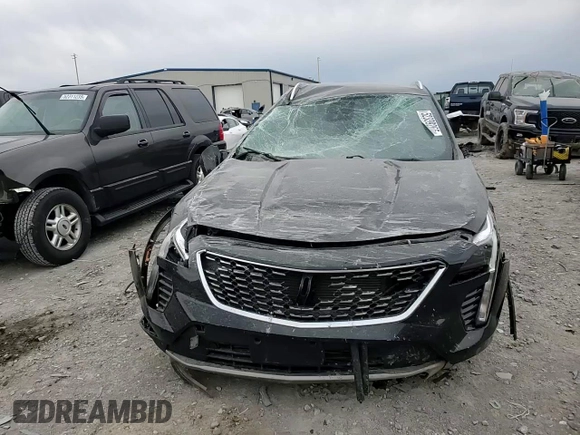 2019 Cadillac XT4 AWD Premium Luxury с VIN 1GYFZDR4XKF117964, выставлен на аукционе Copart как лот 52339265 с пробегом 99 840 миль миль и Списание • Salvage title. История ставок и продаж доступна на DreamBid. Изображение 11.