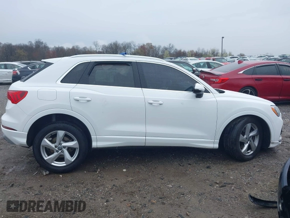 2020 Audi Q3 Premium with VIN WA1AECF35L1030273, listed as a IAAI auction lot 42006553 with 81,944 mi miles. Bid and sale history available at carsss.com. Image 13.