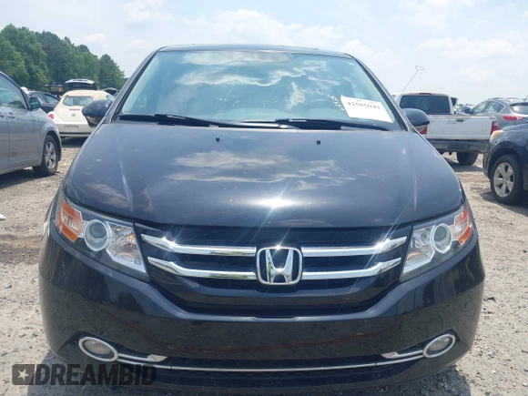 2015 Honda Odyssey Touring Elite with VIN 5FNRL5H90FB003506, listed as a IAAI auction lot 42585049 with 120,543 mi miles and . Bid and sale history available at DreamBid. Image 12.