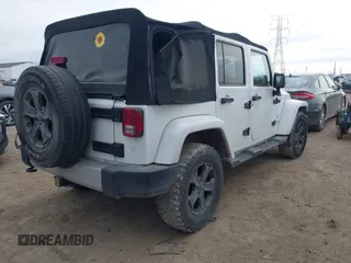 2014 Jeep Wrangler Unlimited Sahara with VIN 1C4BJWEGXEL326585, listed as a IAAI auction lot 41712047 with 155,973 mi miles. Bid and sale history available at carsss.com. Image 4.
