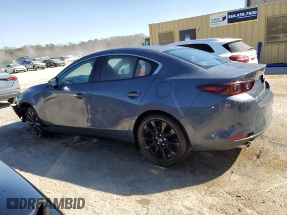 2025 Mazda 3 S Carbon Edition with VIN JM1BPBCM4S1764302, listed as a Copart auction lot 46692245 with 5,099 mi miles and Clean Title. Bid and sale history available at DreamBid. Image 2.
