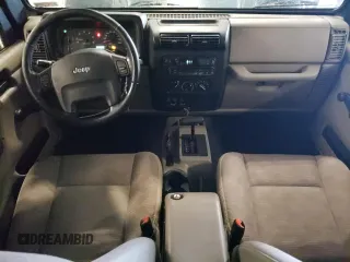 2005 Jeep Wrangler Sport with VIN 1J4FA49S35P341517, listed as a Copart auction lot 65224645 with 153,832 mi miles and Clean title. Bid and sale history available at DreamBid. Image 8.