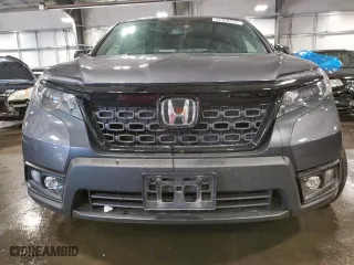 2021 Honda Passport EX-L with VIN 5FNYF8H5XMB021767, listed as a Copart auction lot 54408453 with 33,857 mi miles. Bid and sale history available at carsss.com. Image 5.