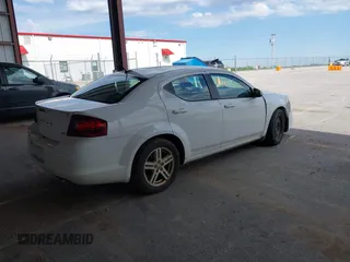 2014 Dodge Avenger SXT z VIN 1C3CDZCB3EN163775, wystawiony jako IAAI lot #42100863 z przebiegiem 178 440 mil mil oraz . Historia ofert i sprzedaży dostępna na DreamBid. Obrazek 4.
