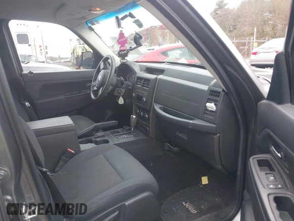 2012 Jeep Liberty Sport with VIN 1C4PJMAK4CW199803, listed as a IAAI auction lot 42025900 with 169,824 mi miles and . Bid and sale history available at carsss.com. Image 5.